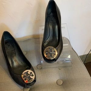 Black leather Tory Burch heels.